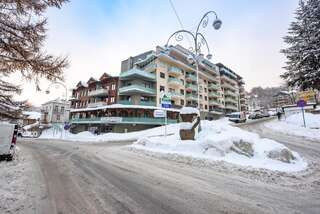 Апартаменты Apartamenty Sun & Snow Zielony Zdrój Крыница-Здруй-7